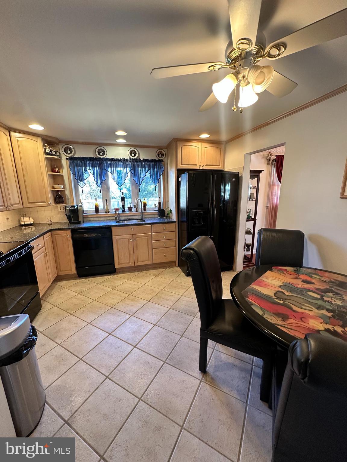 118 Spring House Road Cherry Hill, NJ 08002 - Photo 6 of 19 a large kitchen with a table and chairs