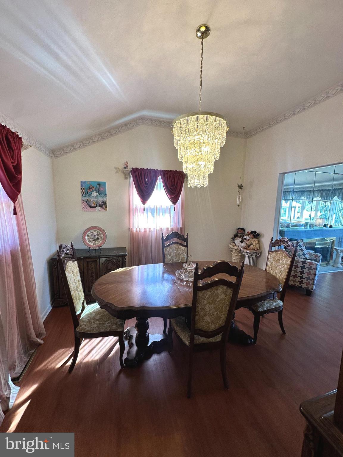 118 Spring House Road Cherry Hill, NJ 08002 - Photo 8 of 19 a dining room with furniture a chandelier and wooden floor