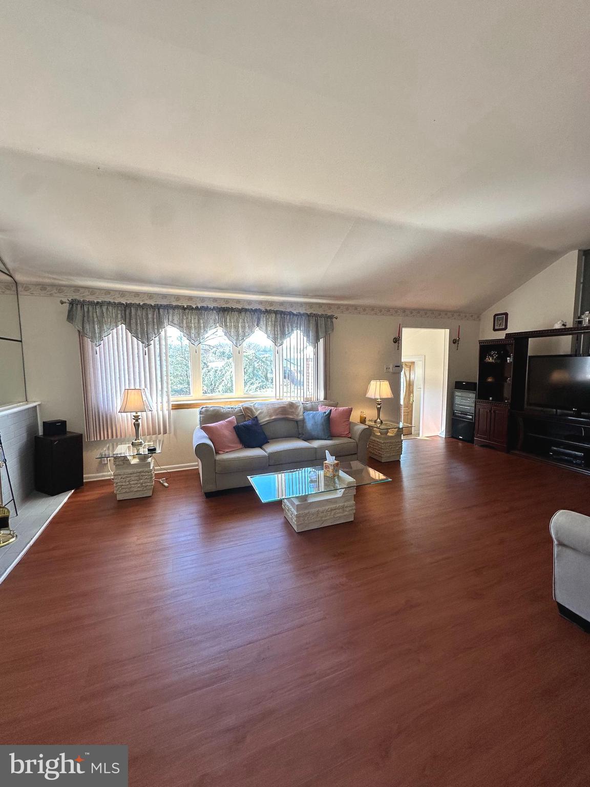 118 Spring House Road Cherry Hill, NJ 08002 - Photo 9 of 19 a living room with furniture and a large window