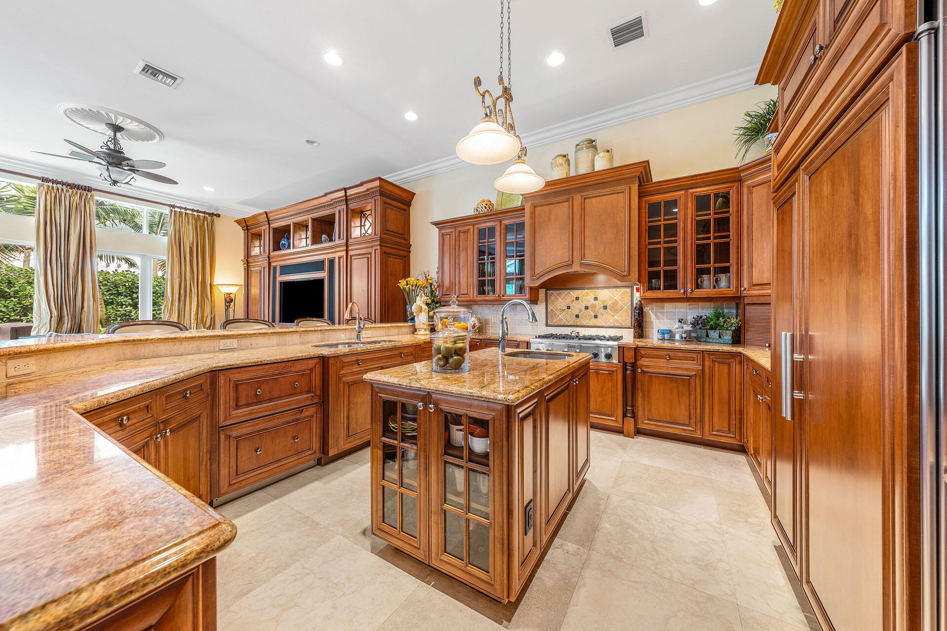 2386 West Maya Palm Drive Boca Raton, FL 33432 - Photo 17 of 76 a kitchen with stainless steel appliances granite countertop a stove and a sink