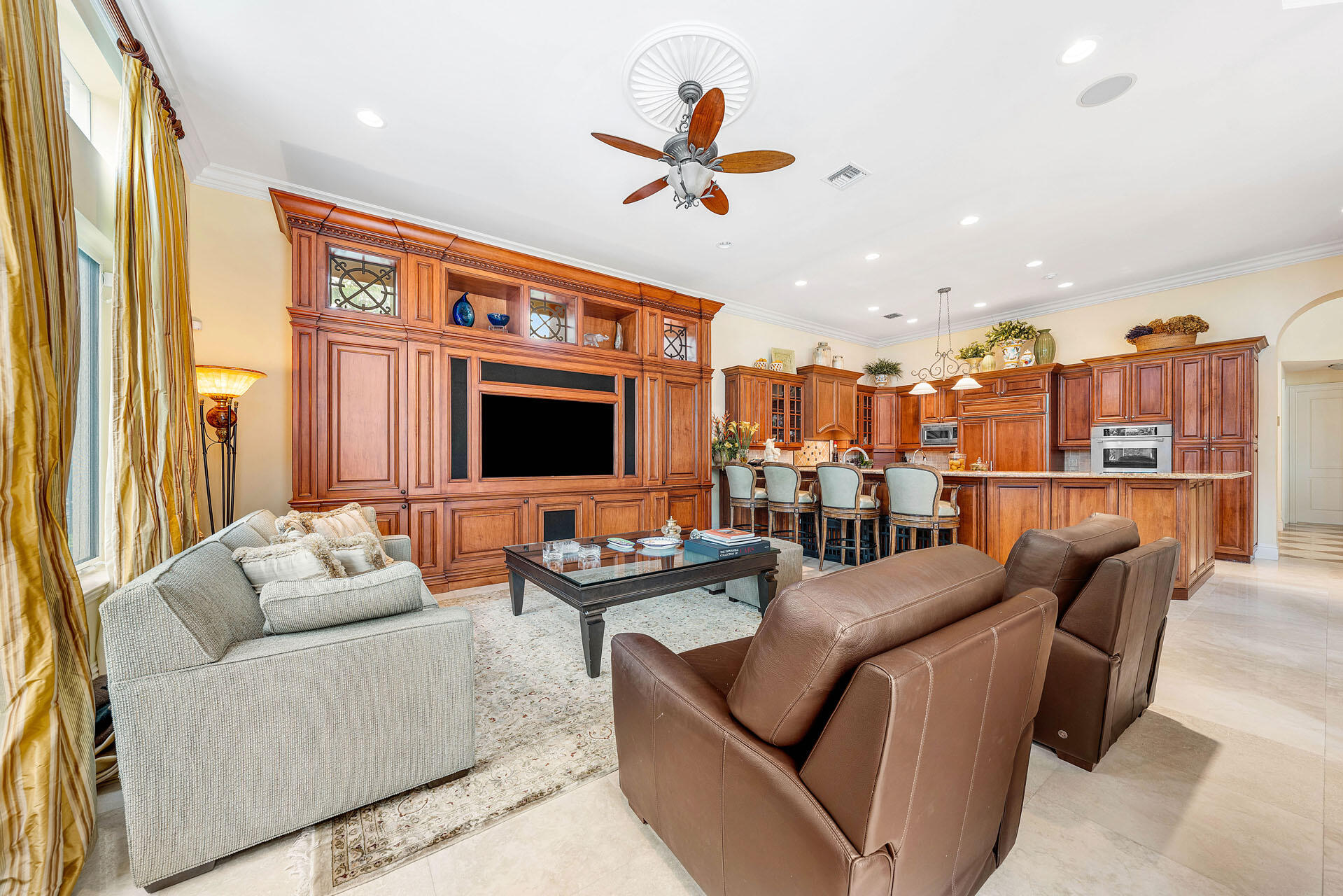 2386 West Maya Palm Drive Boca Raton, FL 33432 - Photo 22 of 76 a living room with furniture kitchen view and a large window