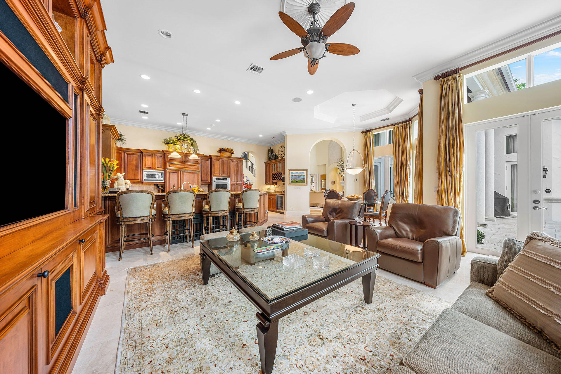 2386 West Maya Palm Drive Boca Raton, FL 33432 - Photo 23 of 76 a living room with furniture and a flat screen tv