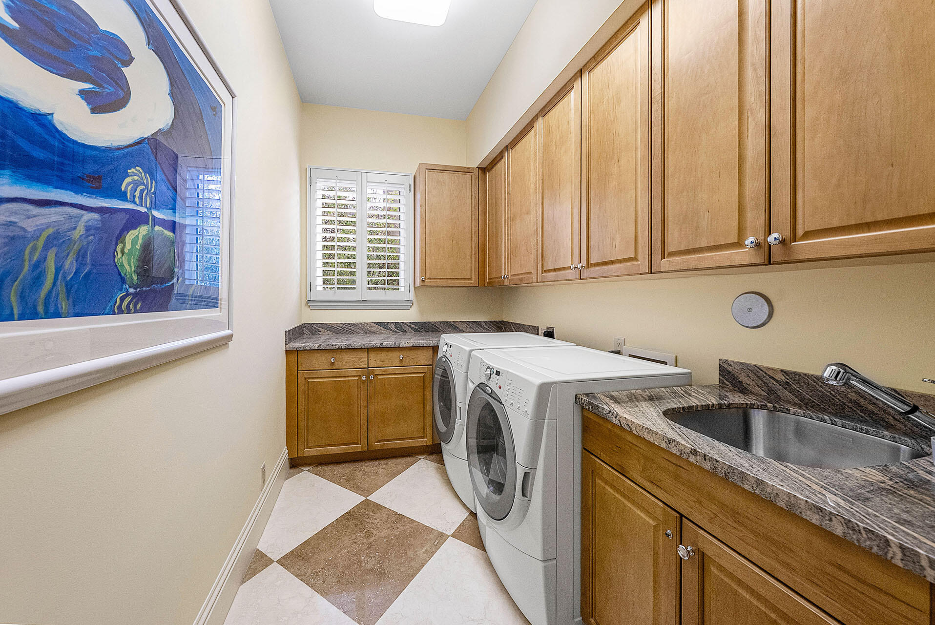 2386 West Maya Palm Drive Boca Raton, FL 33432 - Photo 43 of 76 a utility room with a sink a washer and dryer