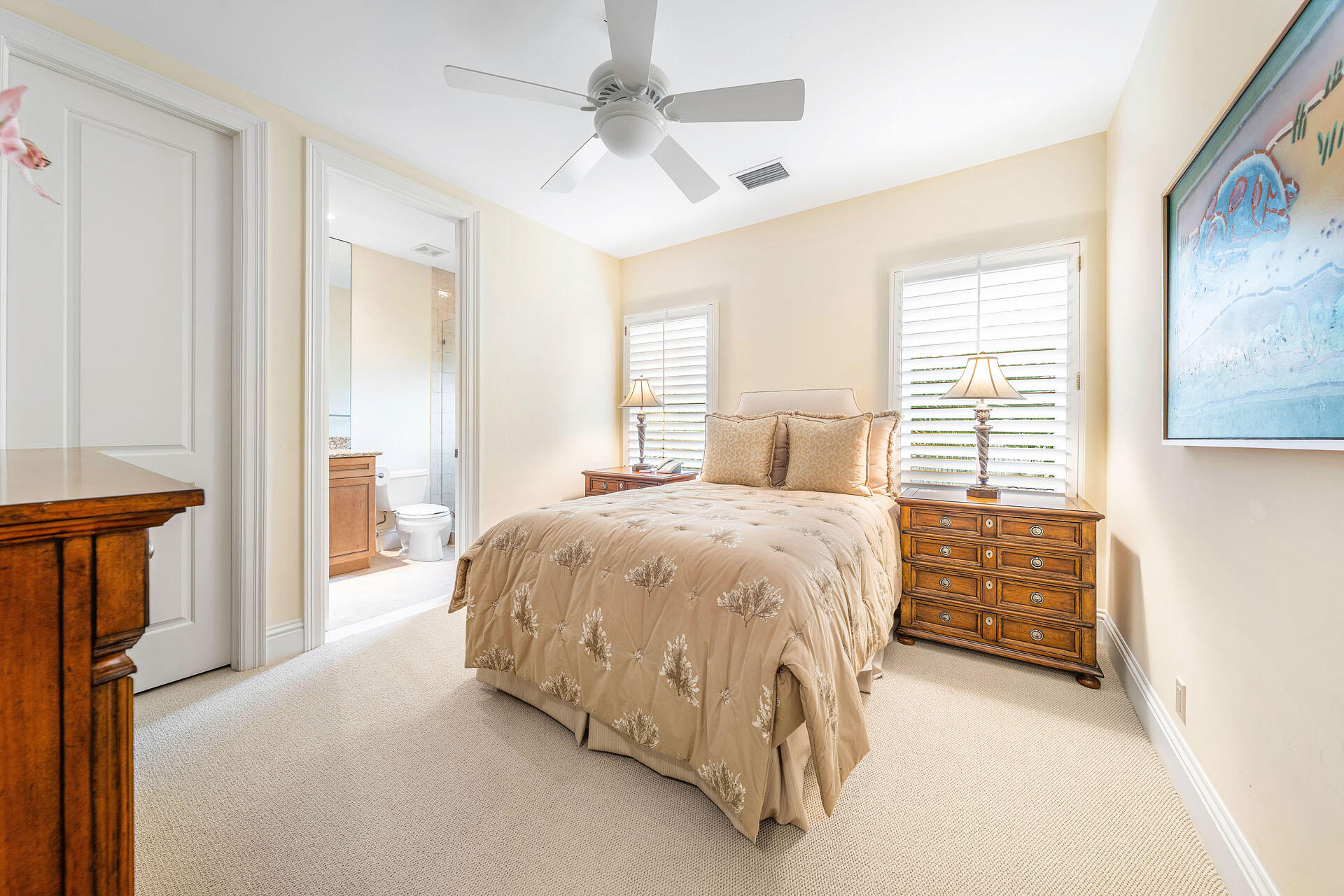 2386 West Maya Palm Drive Boca Raton, FL 33432 - Photo 50 of 76 a spacious bedroom with a bed and a window