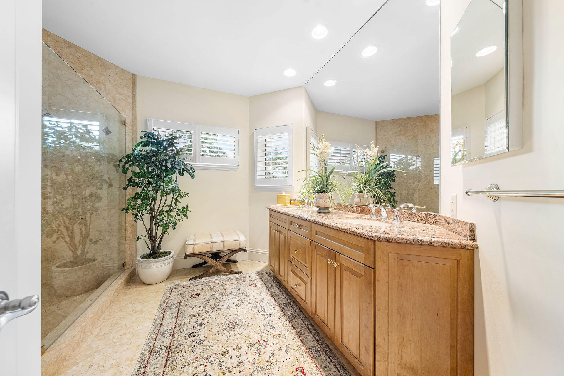 2386 West Maya Palm Drive Boca Raton, FL 33432 - Photo 52 of 76 a bathroom with sink and mirror