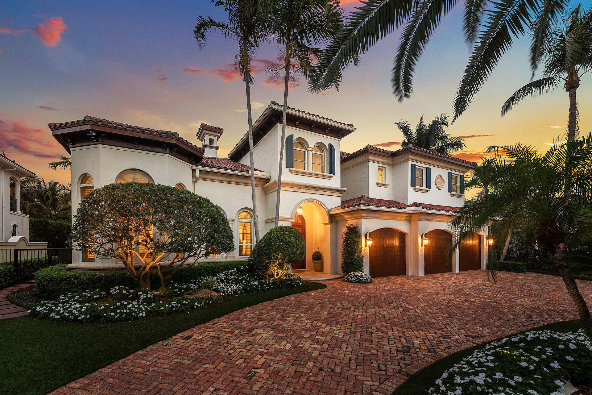 2386 West Maya Palm Drive Boca Raton, FL 33432 - Photo 57 of 76 a front view of a house with a yard