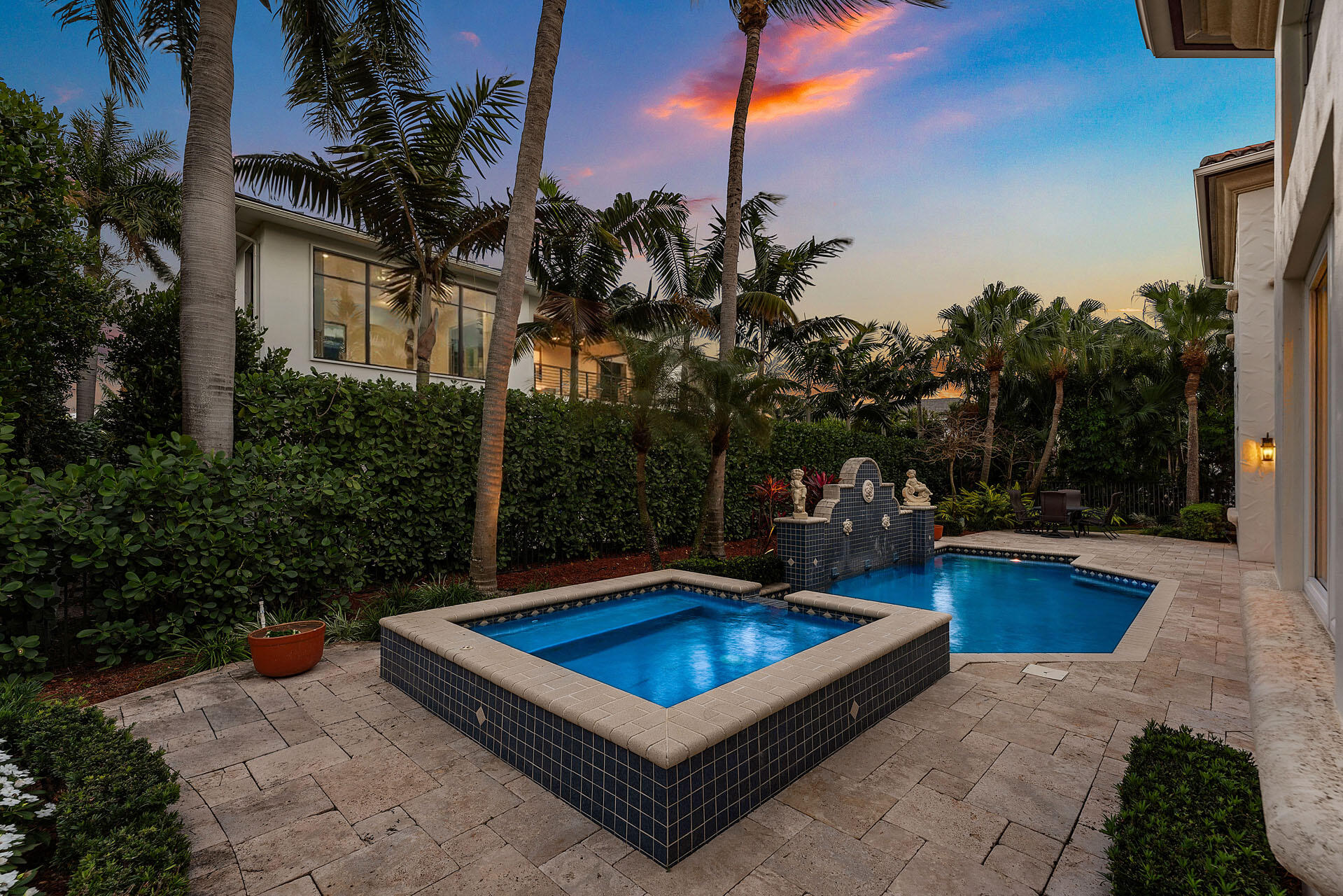 2386 West Maya Palm Drive Boca Raton, FL 33432 - Photo 59 of 76 a view of a swimming pool with a couches in a patio