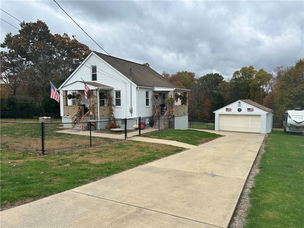124 Giron Street Leechburg, PA 15656 - Photo 1 of 46 a view of a house with a big yard plants and large trees