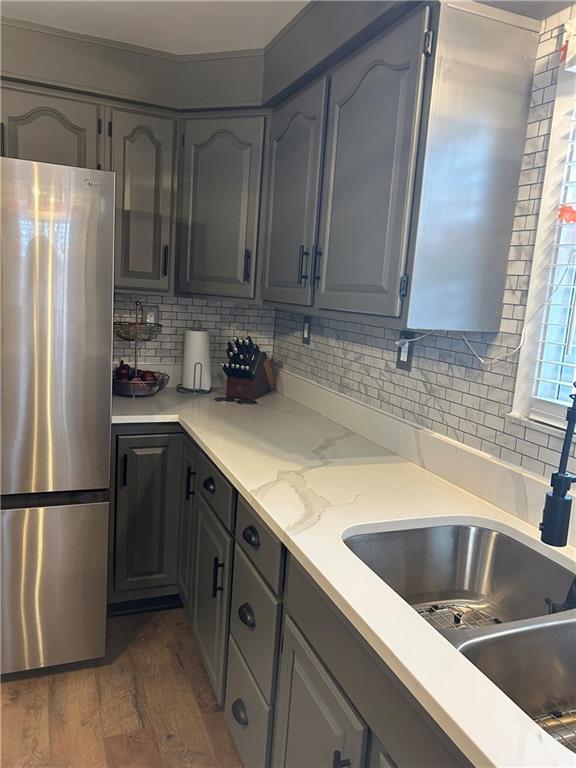 124 Giron Street Leechburg, PA 15656 - Photo 12 of 46 a kitchen with stainless steel appliances granite countertop a refrigerator a sink and a stove