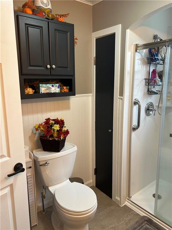 124 Giron Street Leechburg, PA 15656 - Photo 24 of 46 a white toilet sitting next to a bathroom sink