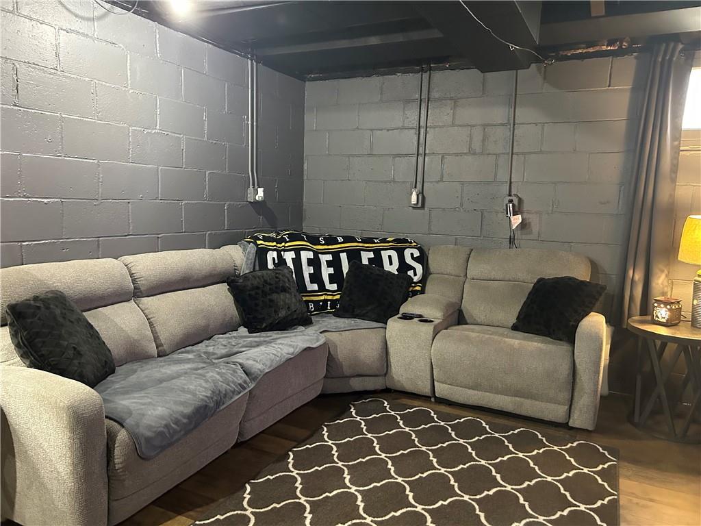 124 Giron Street Leechburg, PA 15656 - Photo 31 of 46 a couch sitting in a living room with a couch