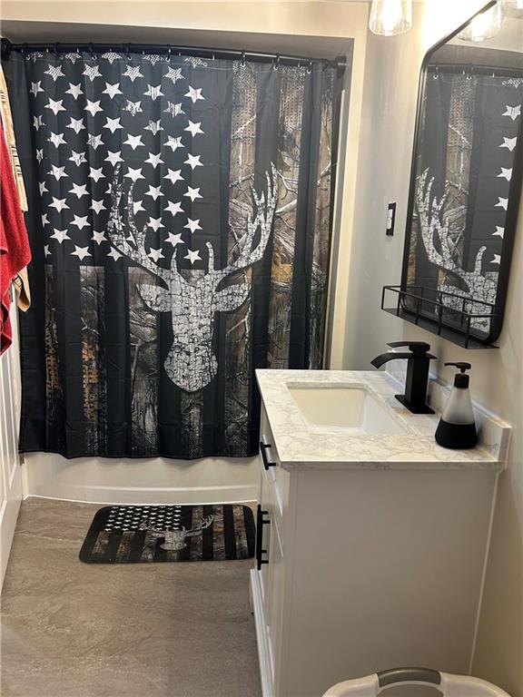 124 Giron Street Leechburg, PA 15656 - Photo 34 of 46 a bathroom with a toilet a sink and mirror