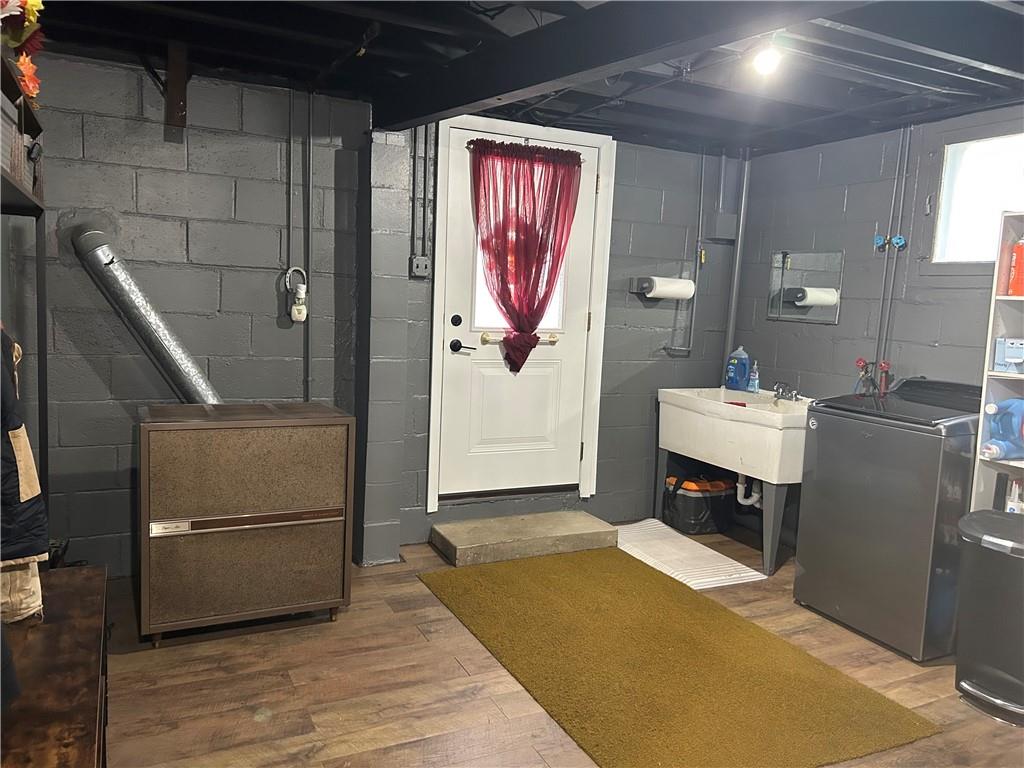 124 Giron Street Leechburg, PA 15656 - Photo 38 of 46 a bedroom with a bed and a mirror