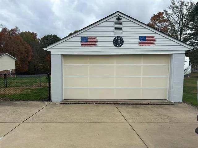 a view of field with trees in the background