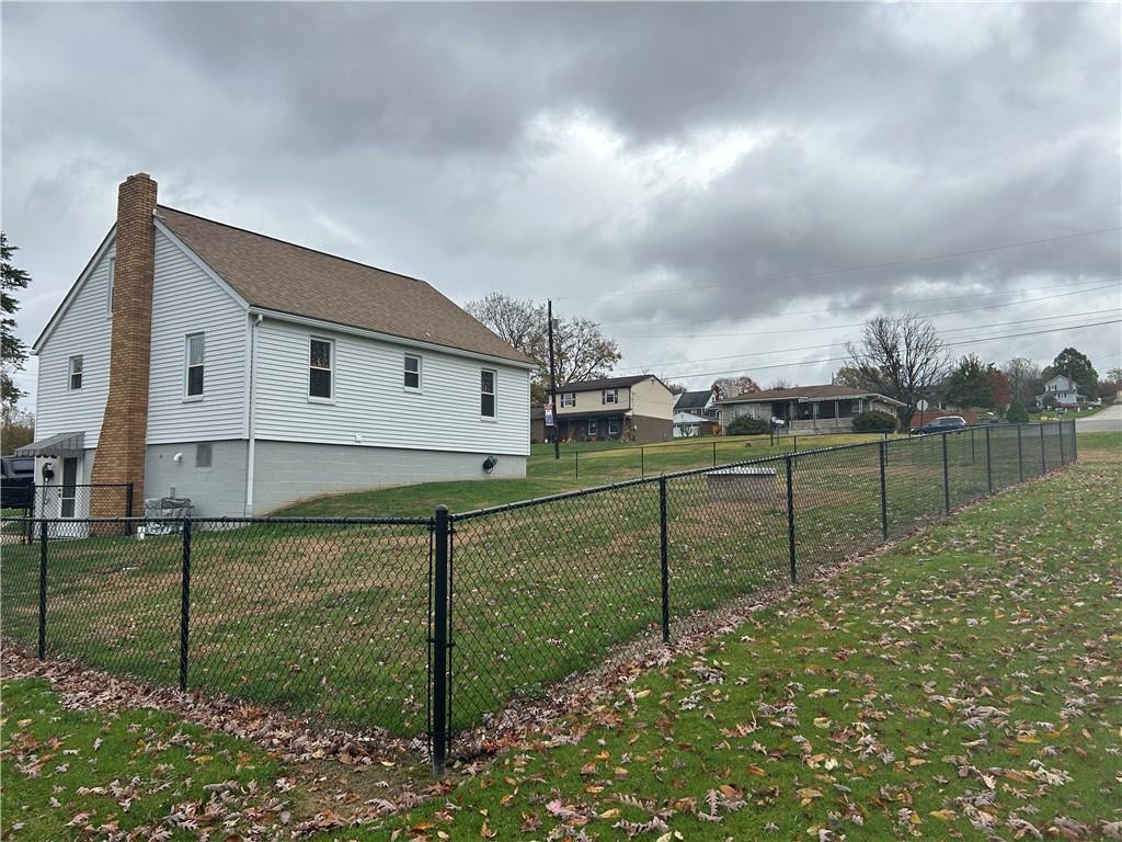 124 Giron Street Leechburg, PA 15656 - Photo 46 of 46 a view of a house with backyard and fence