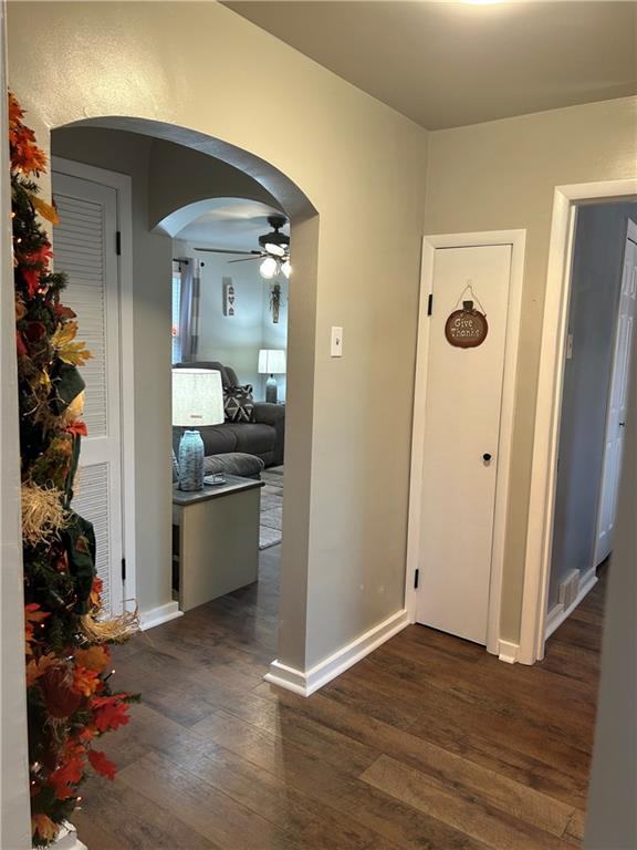 124 Giron Street Leechburg, PA 15656 - Photo 8 of 46 a view of a hallway to a livingroom with furniture and windows