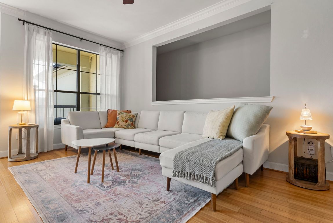 7701 Rialto Boulevard, Unit 1426 Austin, TX 78735 - Photo 7 of 29 a living room with furniture and a large window