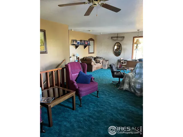 a view of a balcony with wooden fence