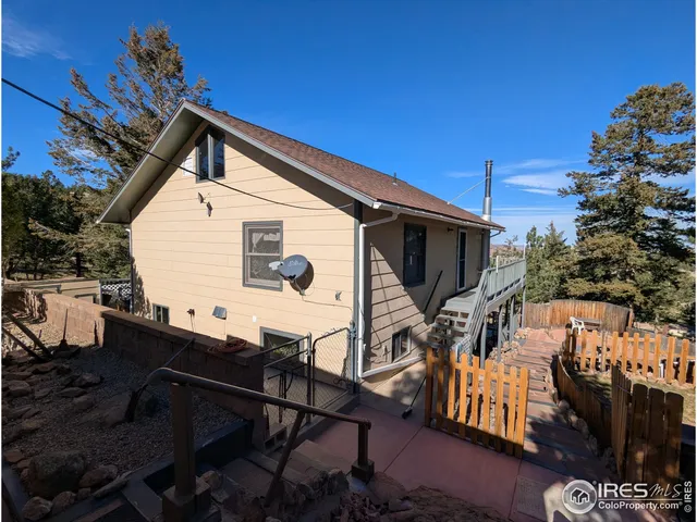 a view of a house with a deck