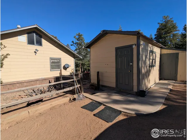 a view of a balcony with furniture