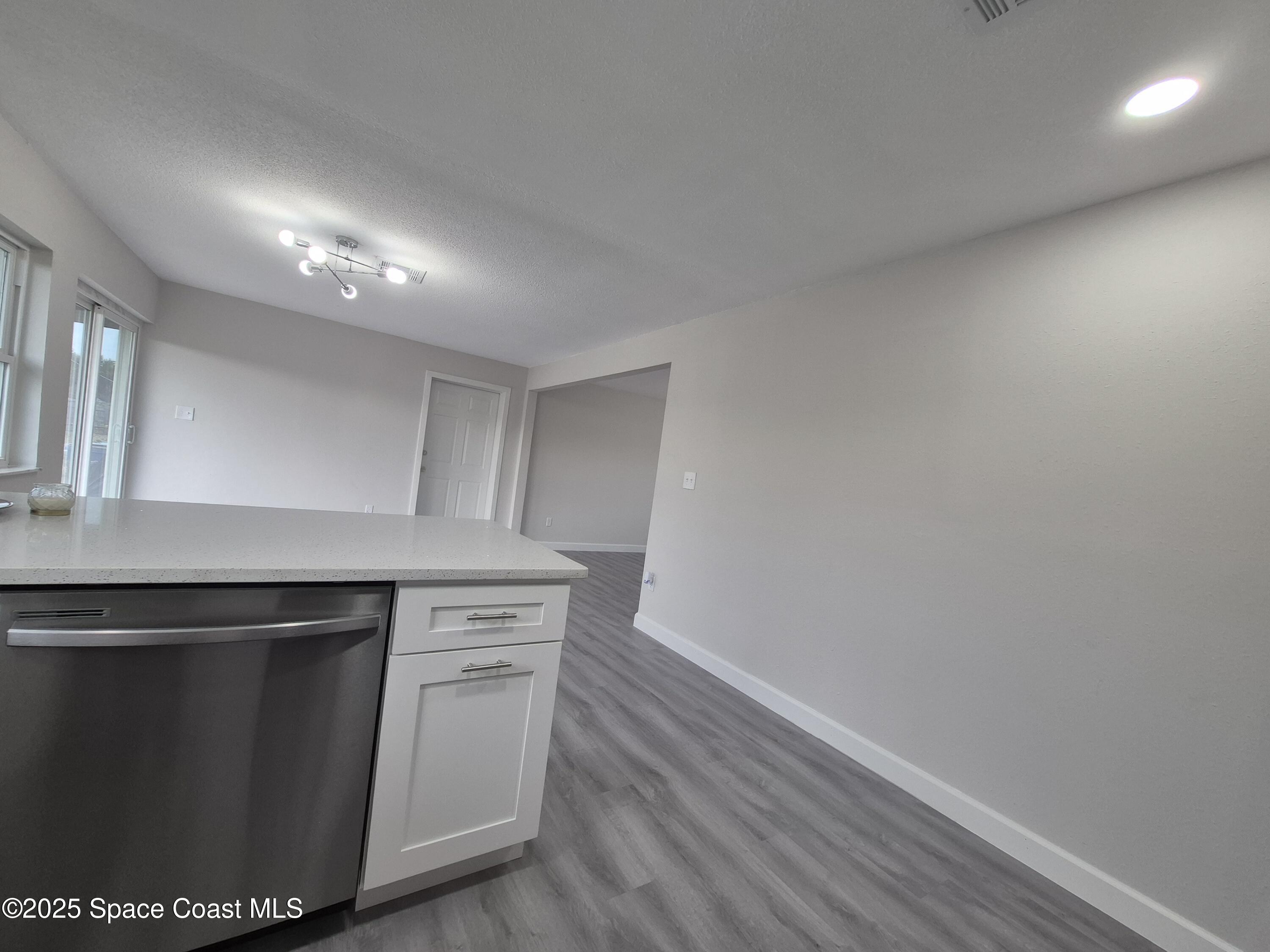 980 Bacon Circle Northeast Palm Bay, FL 32905 - Photo 19 of 50 a view wooden cabinets