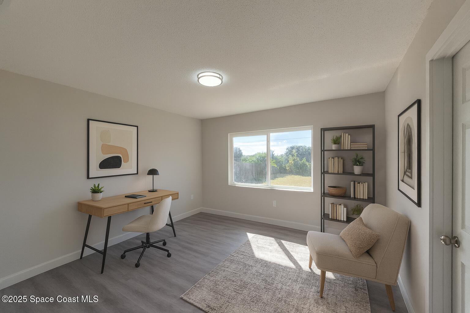 980 Bacon Circle Northeast Palm Bay, FL 32905 - Photo 23 of 50 a workspace with furniture and window