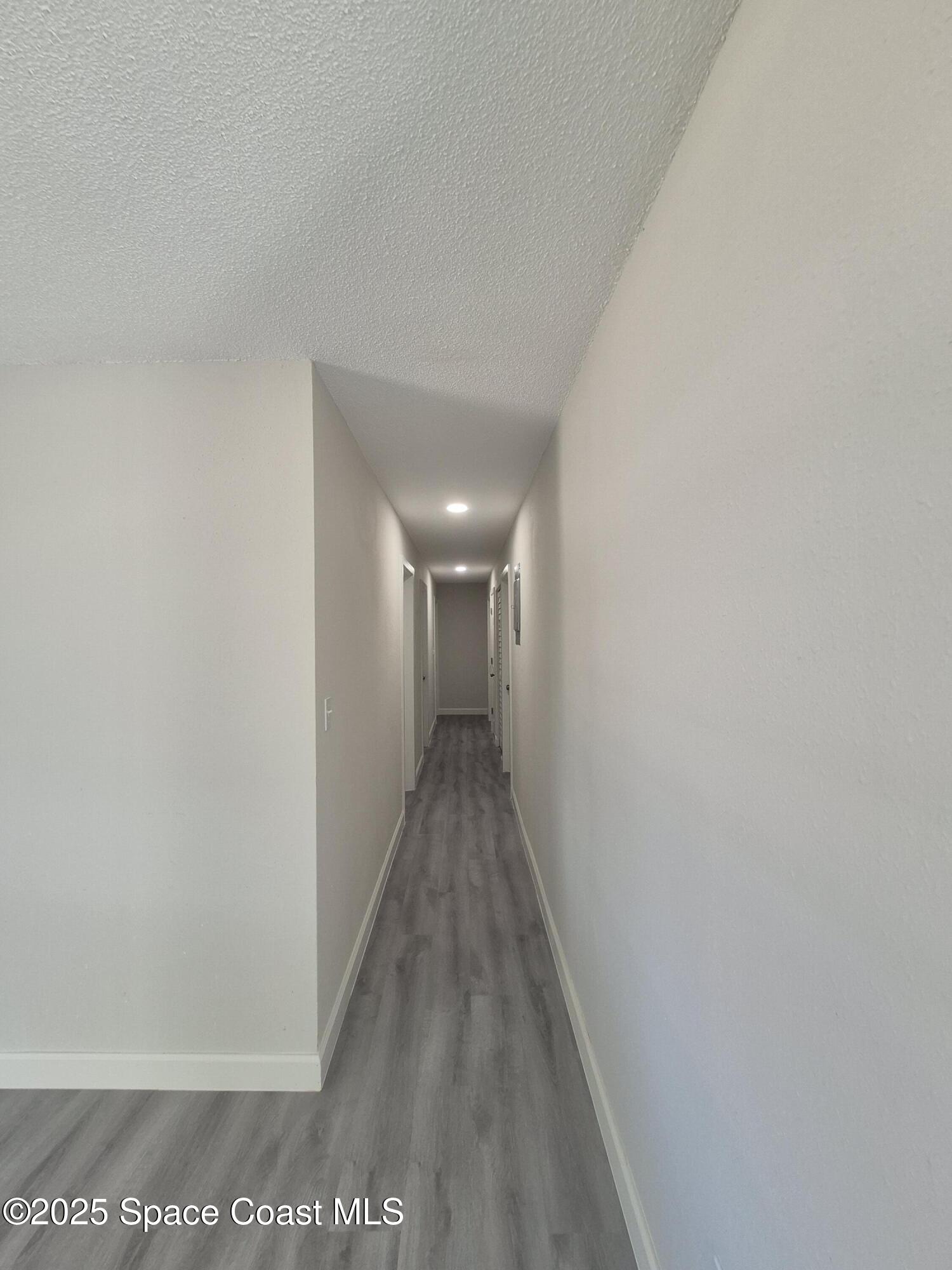 980 Bacon Circle Northeast Palm Bay, FL 32905 - Photo 38 of 50 a view of a hallway