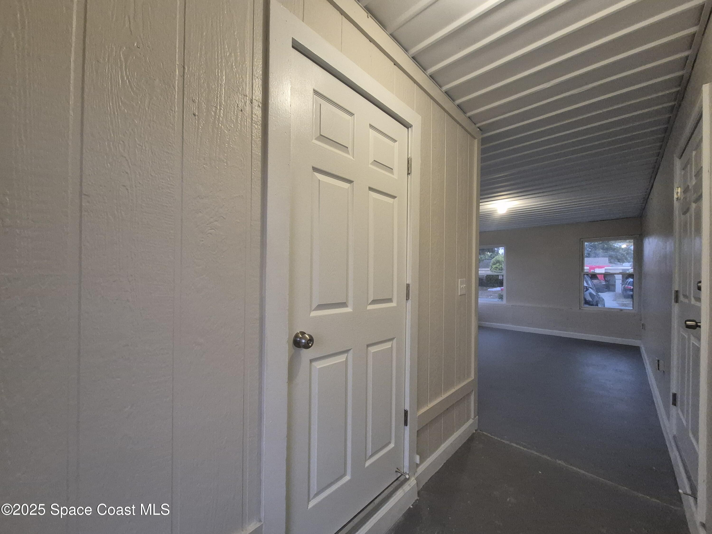 980 Bacon Circle Northeast Palm Bay, FL 32905 - Photo 44 of 50 a view of a hallway