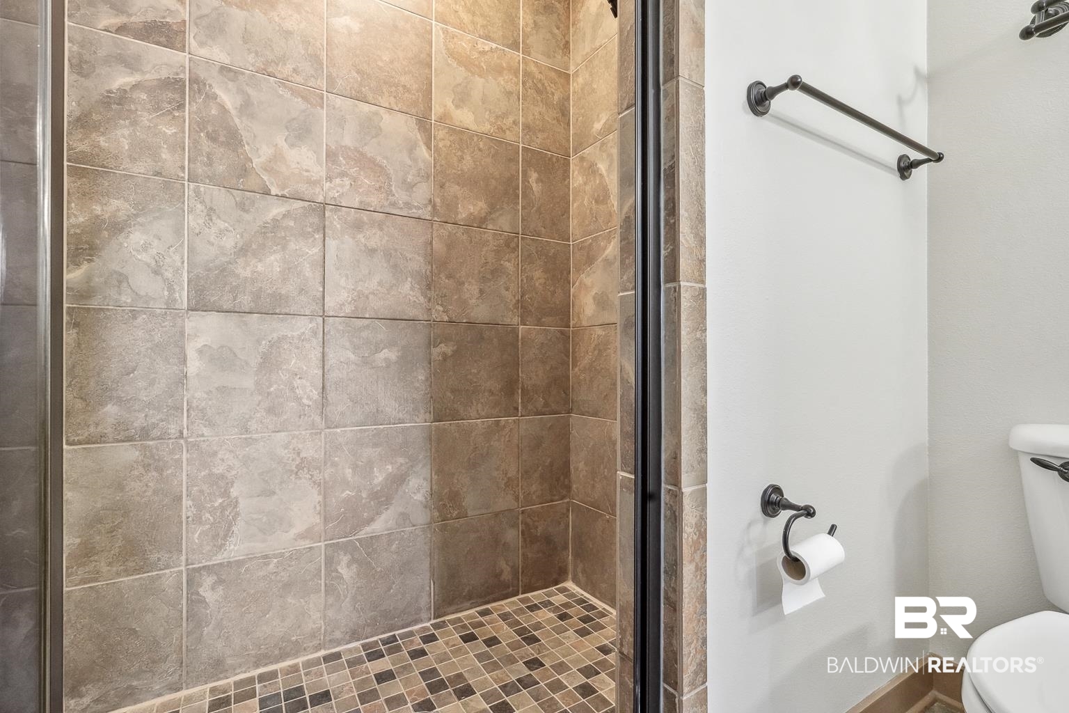 1430 Regency Road, Unit H201 Gulf Shores, AL 36542 - Photo 38 of 49 Bathroom featuring a stall shower and toilet
