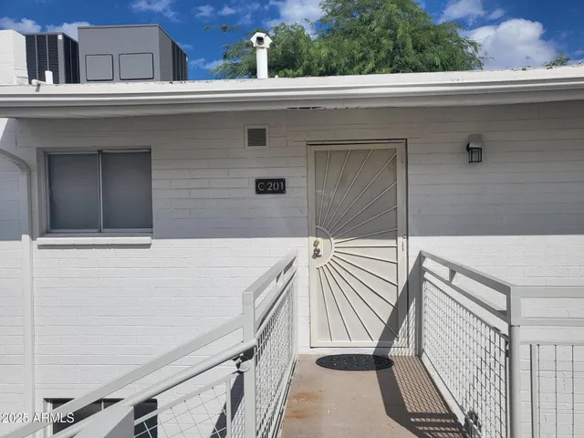 a view of a balcony with staircase