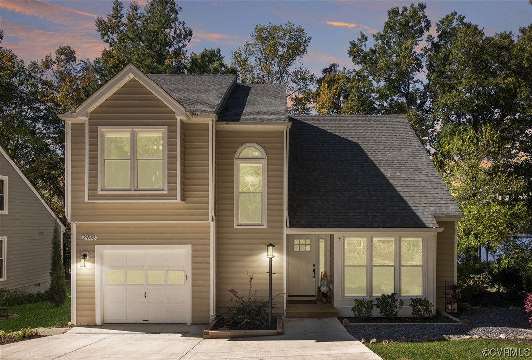 2908 Cove Ridge Trace Midlothian, VA 23112 - Photo 1 of 49 a front view of a house with garden