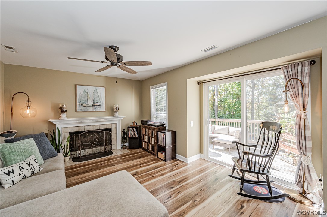 2908 Cove Ridge Trace Midlothian, VA 23112 - Photo 14 of 49 a living room with furniture and a fireplace