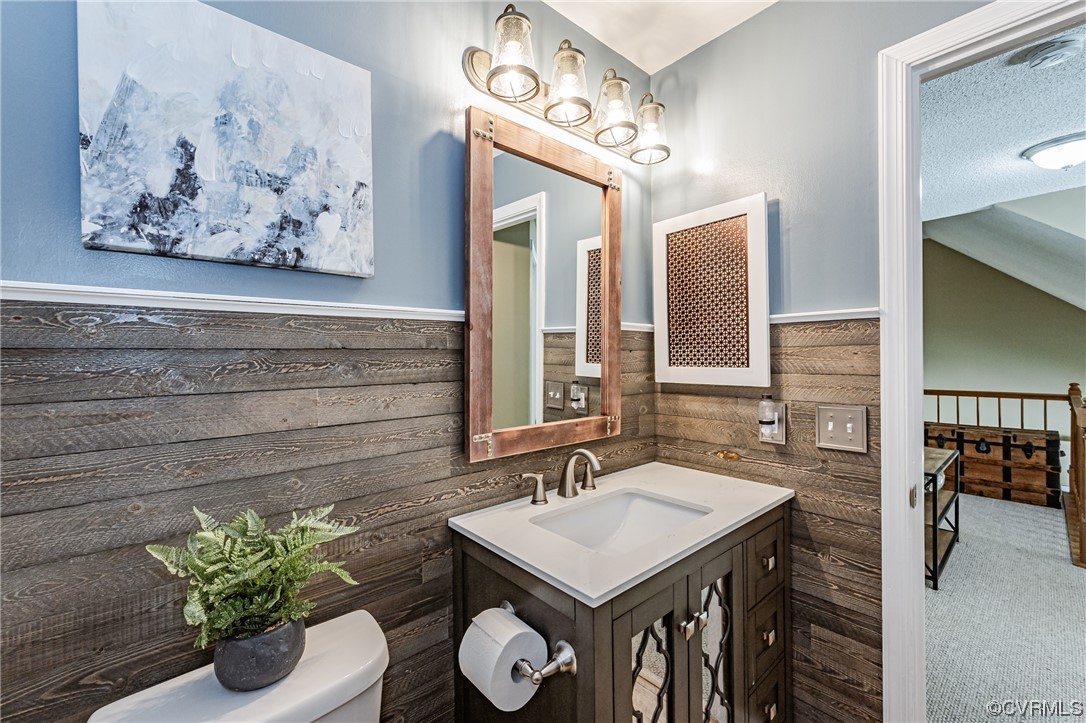 2908 Cove Ridge Trace Midlothian, VA 23112 - Photo 29 of 49 a bathroom with a sink and a mirror