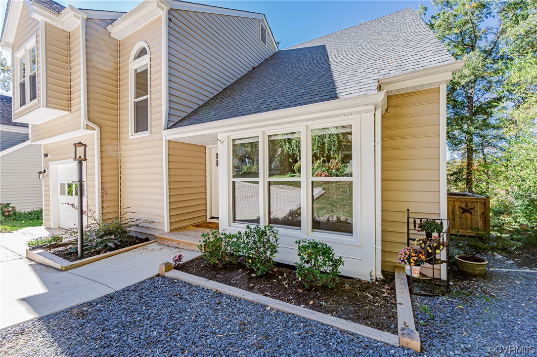 2908 Cove Ridge Trace Midlothian, VA 23112 - Photo 39 of 49 a front view of a house with garden