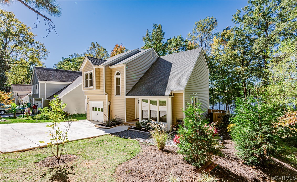2908 Cove Ridge Trace Midlothian, VA 23112 - Photo 40 of 49 a front view of a house with a yard