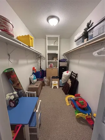 a room with furniture and a couch
