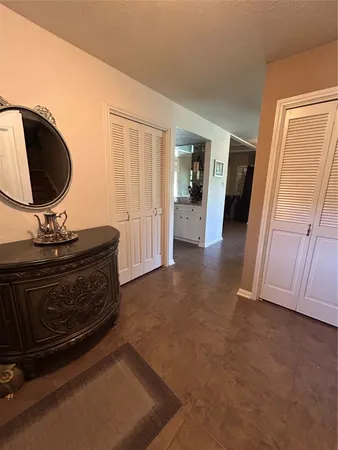 a view of a hallway with washer and dryer
