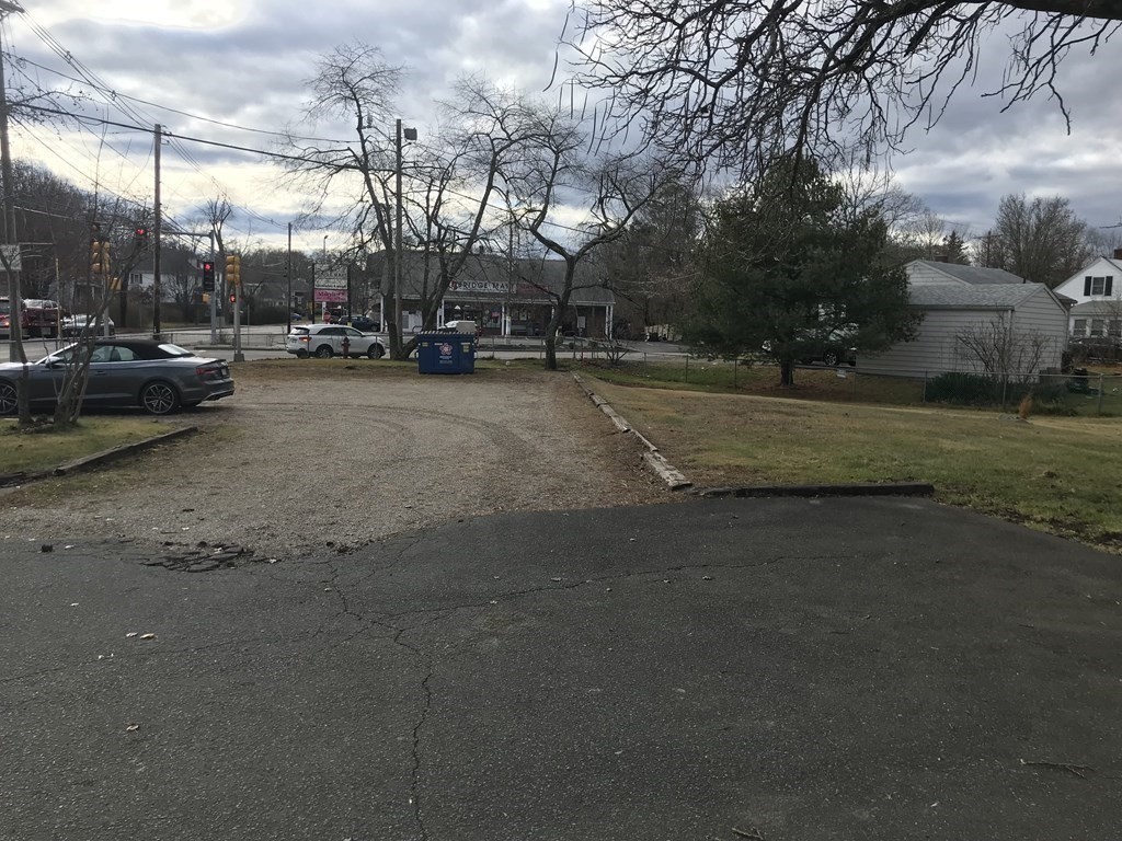 176 Plymouth Street, Unit 2 Bridgewater, MA 02324 - Photo 3 of 11 a view of street with houses