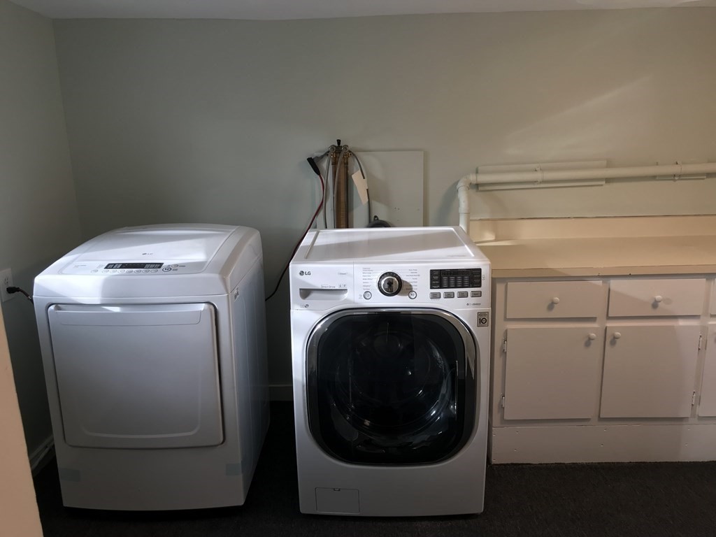 176 Plymouth Street, Unit 2 Bridgewater, MA 02324 - Photo 7 of 11 a utility room with dryer and washer