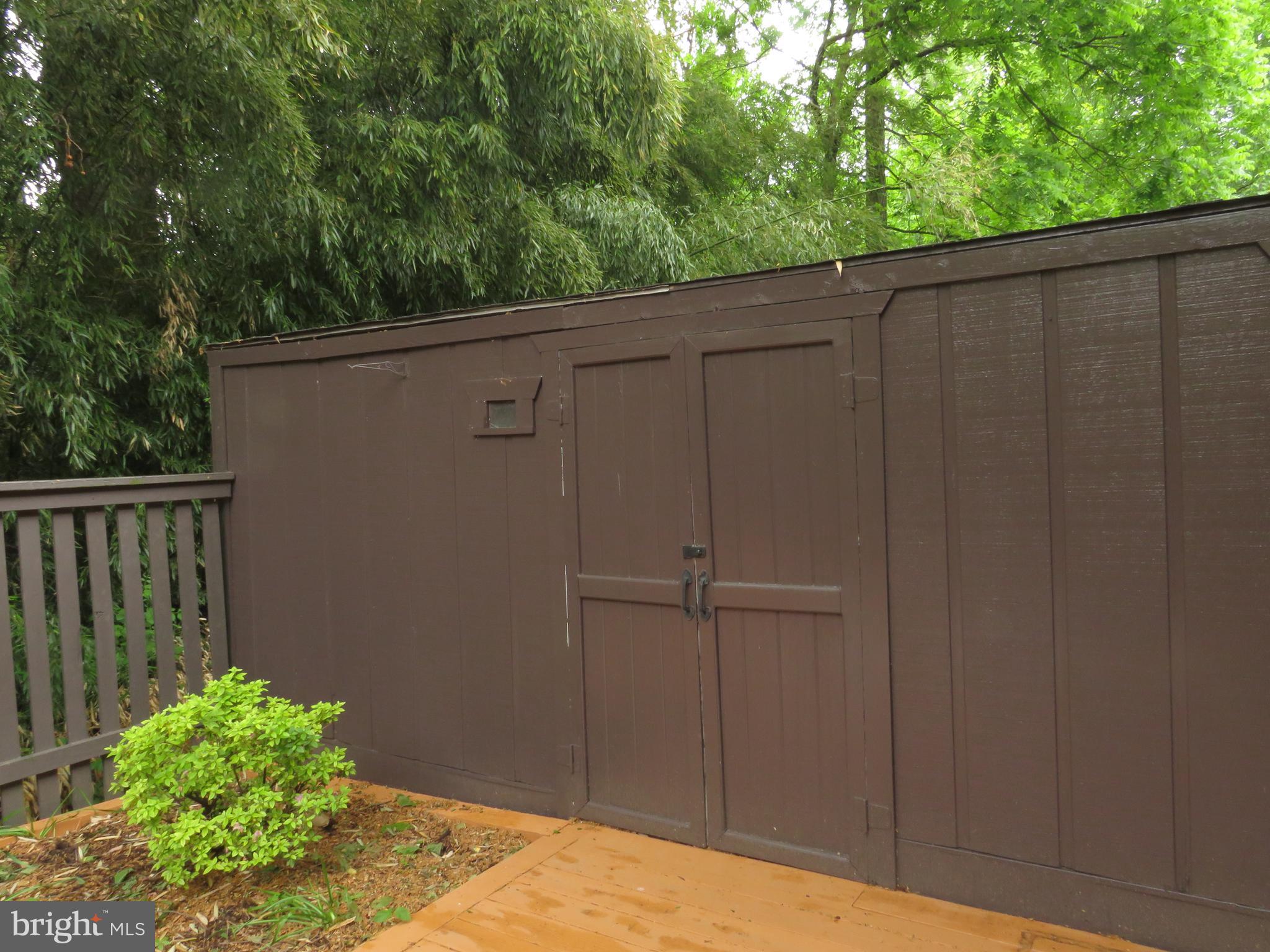 1709 Ivy Oak Square, Unit 18 Reston, VA 20190 - Photo 3 of 22 Plenty of storage in the shed with electric