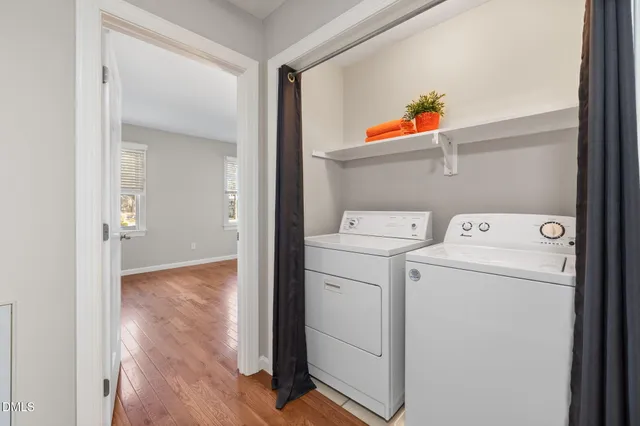 a view of storage room with washer and dryer