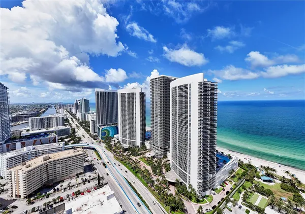 a view of a city with tall buildings