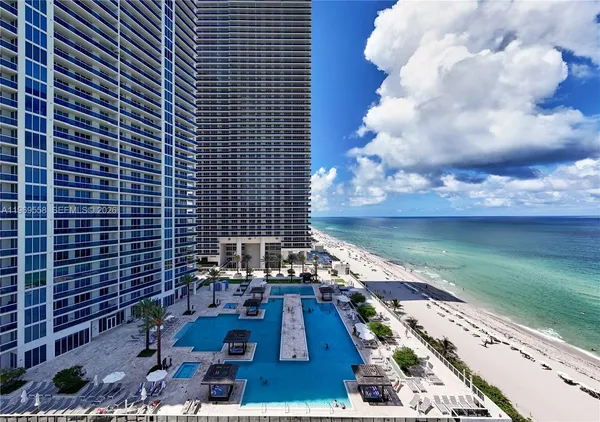 a view of a city with tall buildings