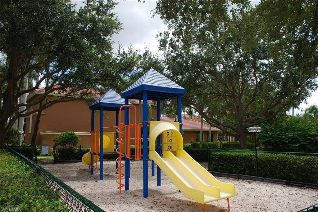 1130 Reserve Way, Unit 208 Naples, FL 34105 - Photo 14 of 14 a view of a park with slide
