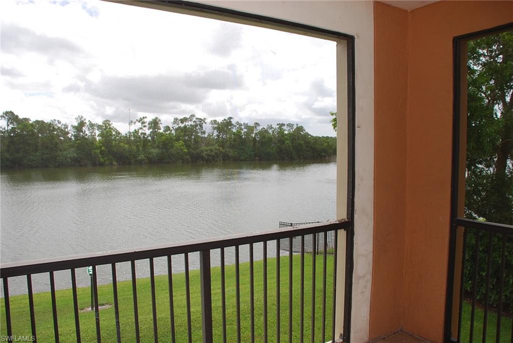 1130 Reserve Way, Unit 208 Naples, FL 34105 - Photo 3 of 14 a city view from a balcony