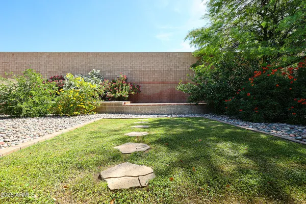a view of yard with swimming pool