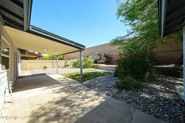 a view of a back yard of the house