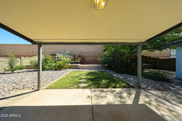 a view of backyard with green space