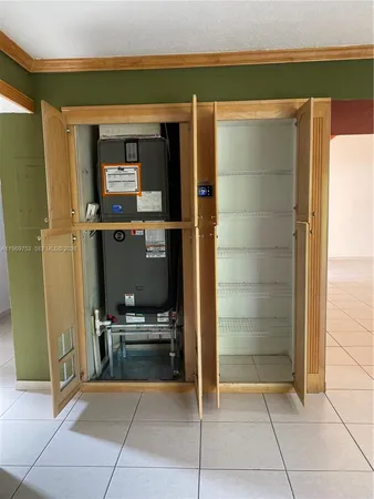 a view of storage and utility room