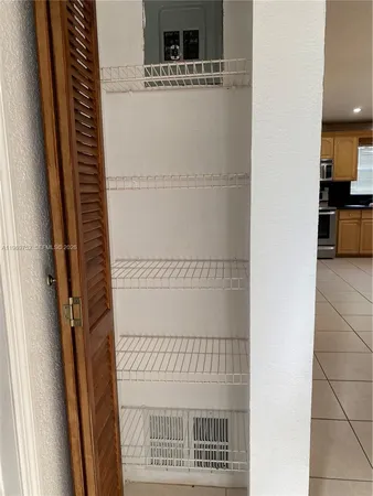 a bathroom with a shower and a sink